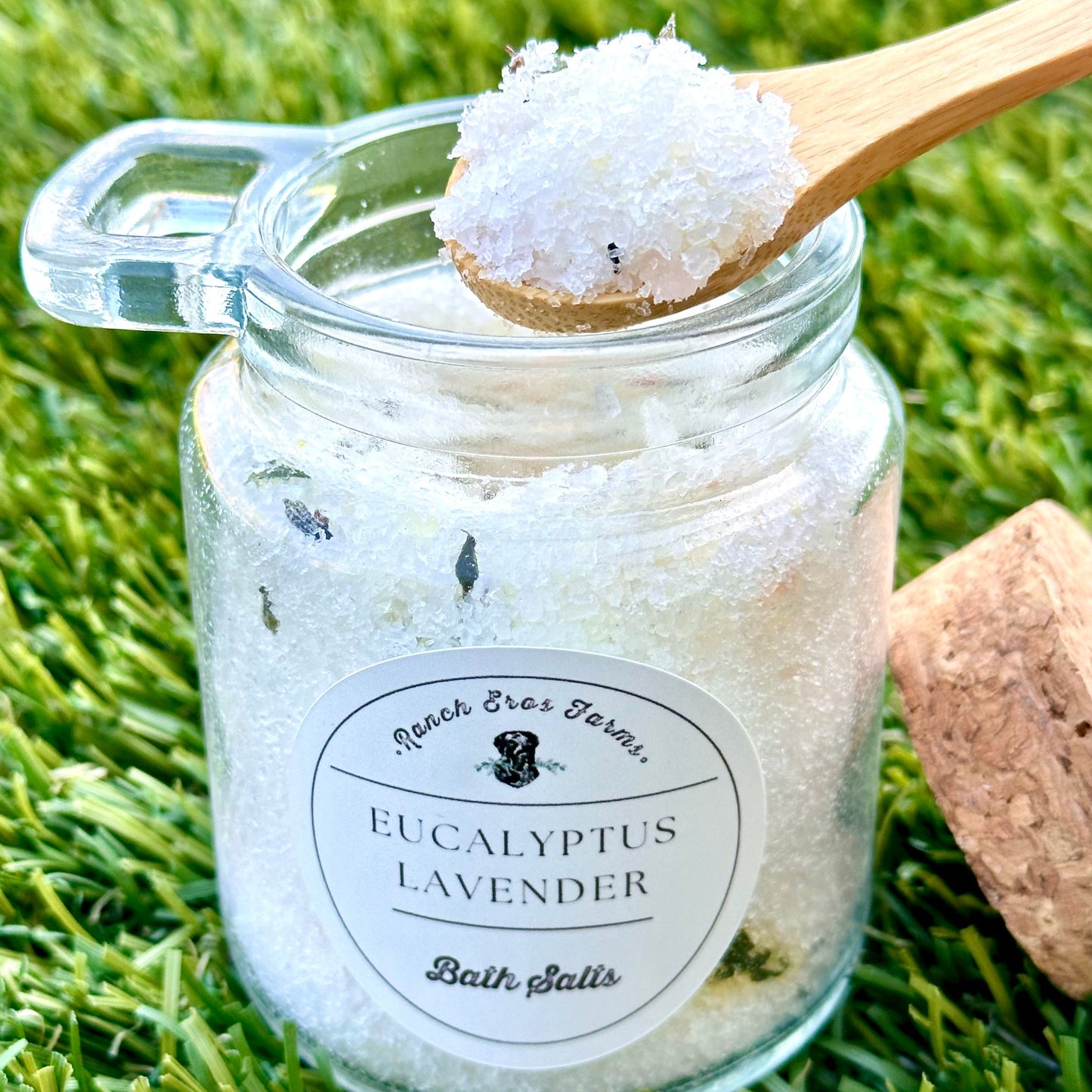 eucalyptus lavender bath salts with wooden spoon scooping out salts